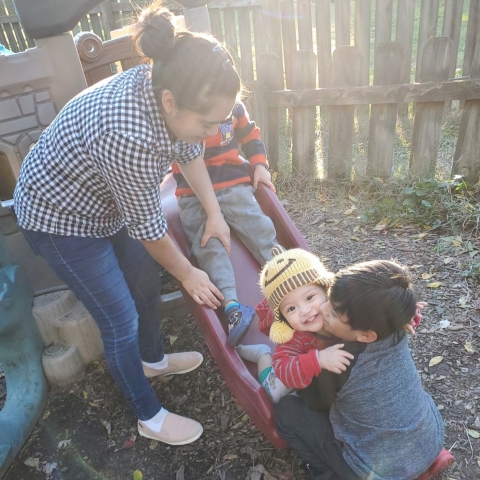 Maria and children playing