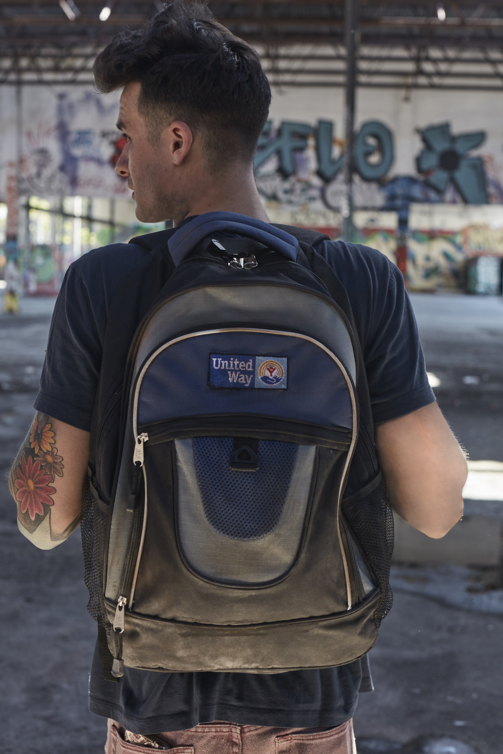 Young man with United Way backpack