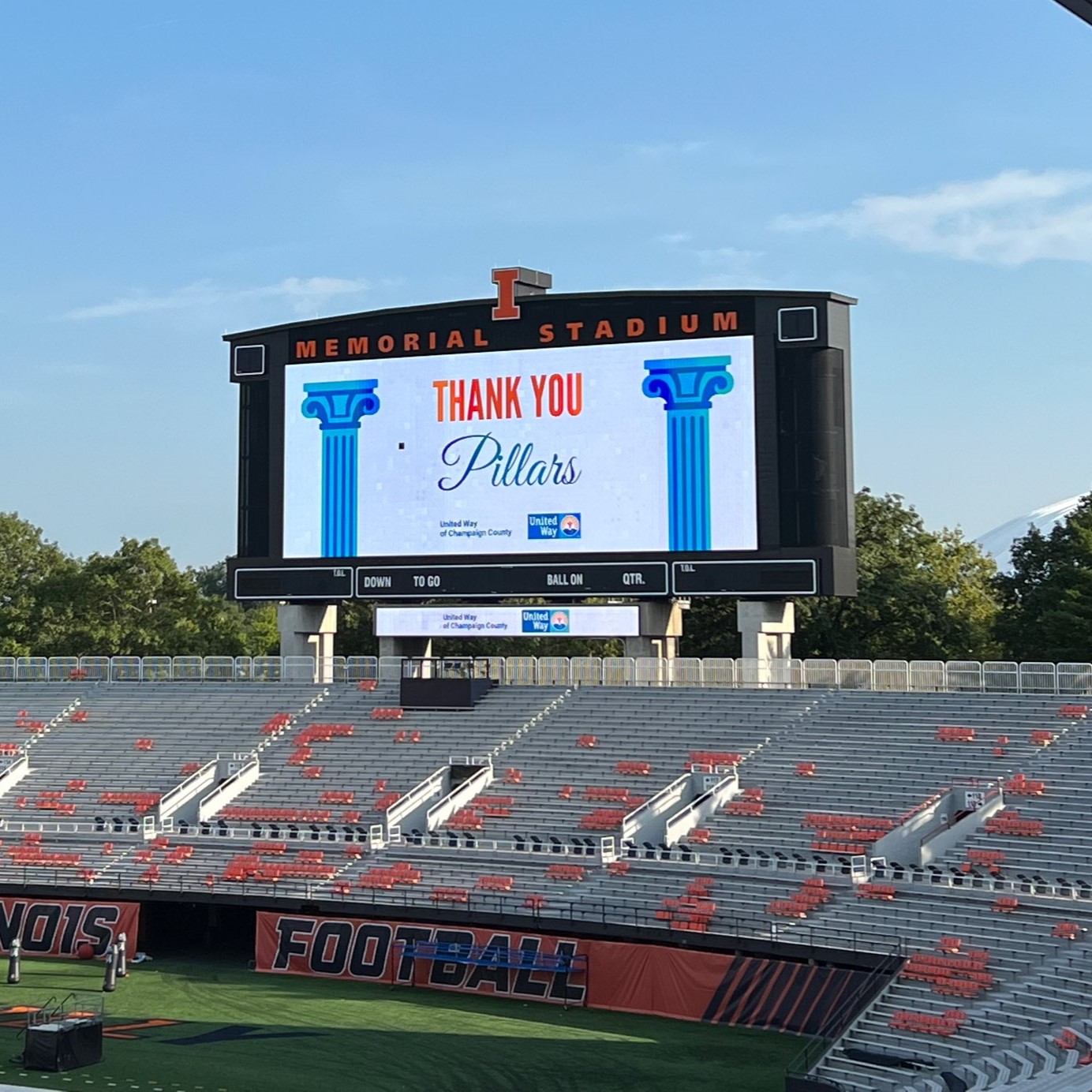 Thank You Pillars is displayed on the jumbotron at Memorial Stadium