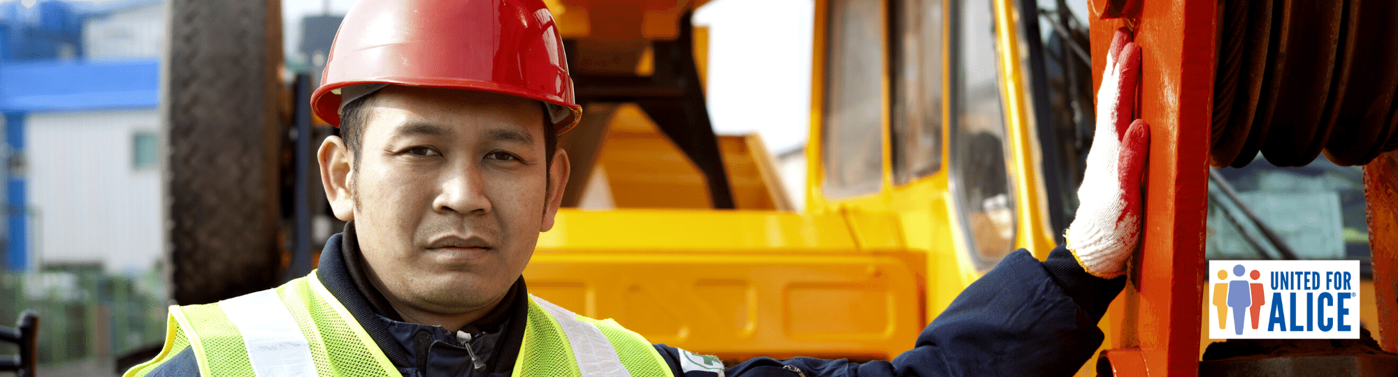 Man in hard hat at a work site