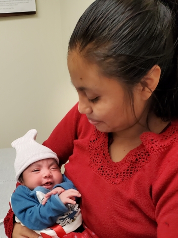 Woman holding infant